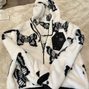 White and Black Fleece Jacket with Skull Design